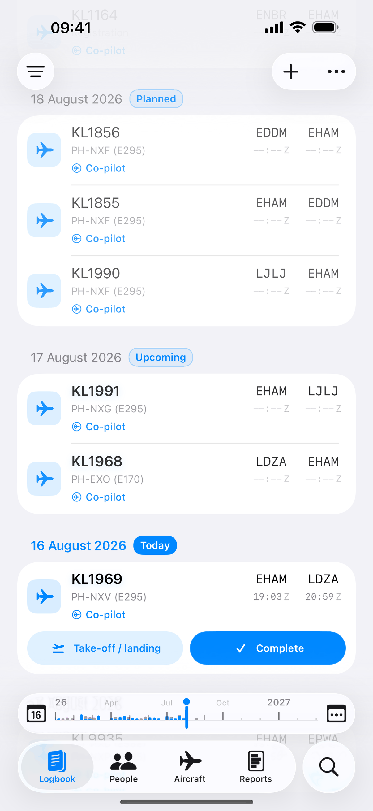 The Jetlog logbook: logged and upcoming flights with one-tap complete actions and the month scrubber.